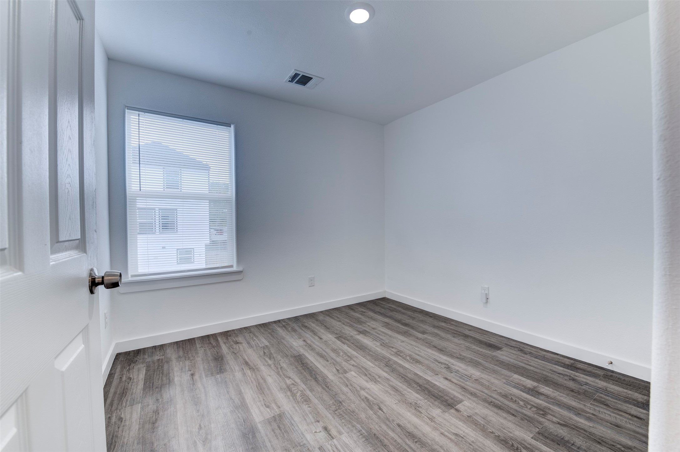 6309 Sandra Street, Unit B/2 Houston, TX 77028 - Photo 17 of 23 a view of a room that has wooden floor and cabinets