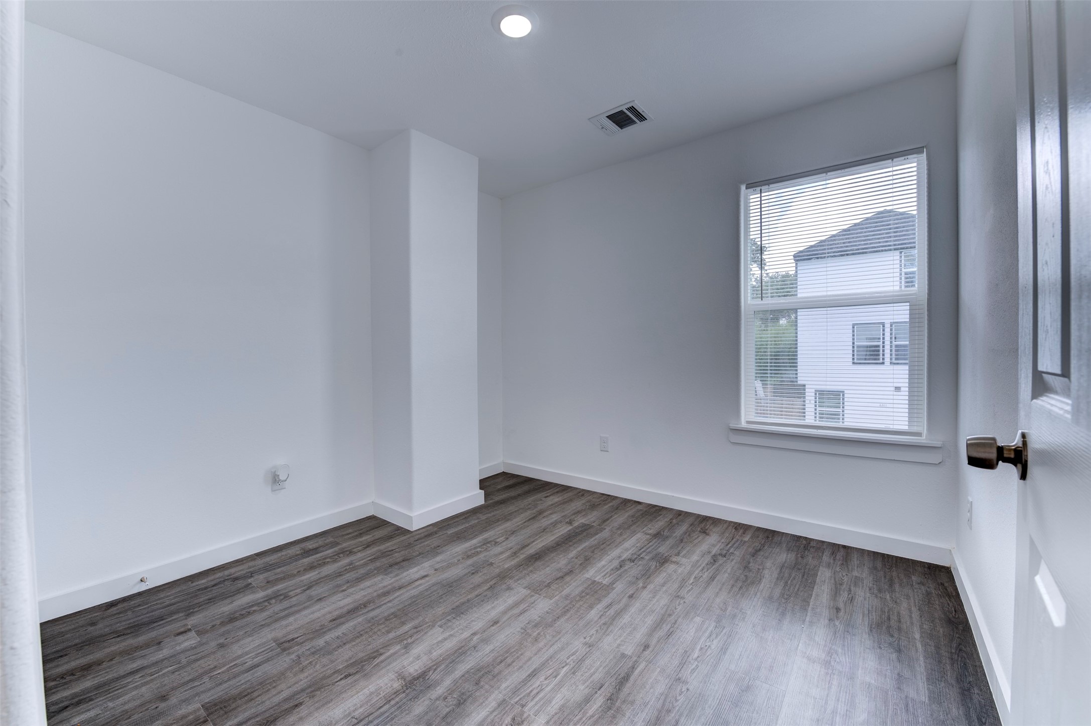 6309 Sandra Street, Unit B/2 Houston, TX 77028 - Photo 18 of 23 wooden floor in an empty room