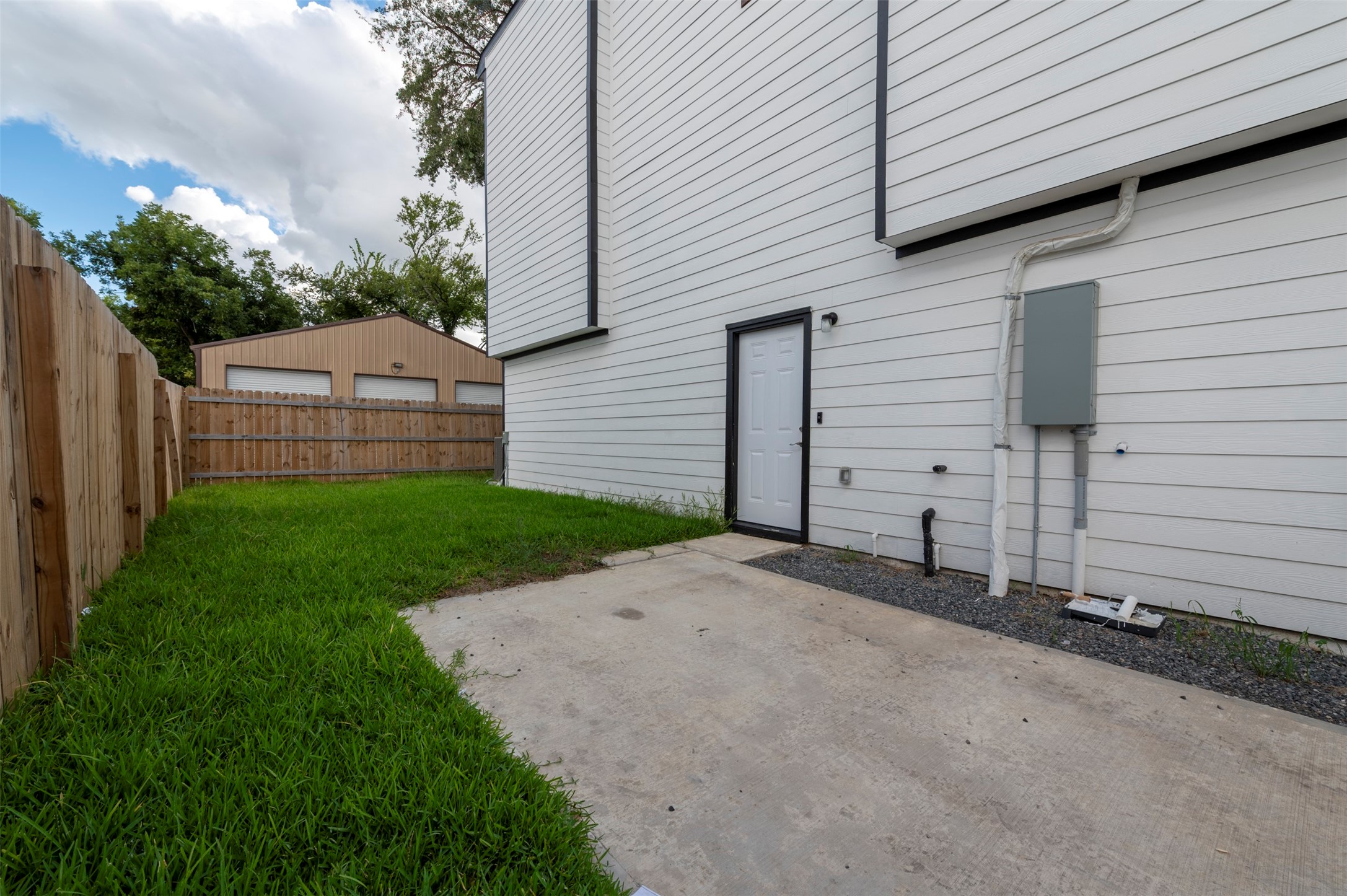 6309 Sandra Street, Unit B/2 Houston, TX 77028 - Photo 4 of 23 a view of an house with backyard and trees
