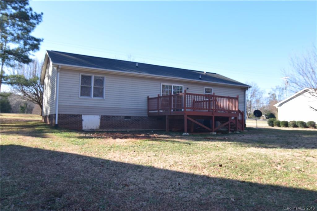 8667 Unity Church Road Denver, NC 28037 - Photo 19 of 23 a view of a house with swimming pool in front of it