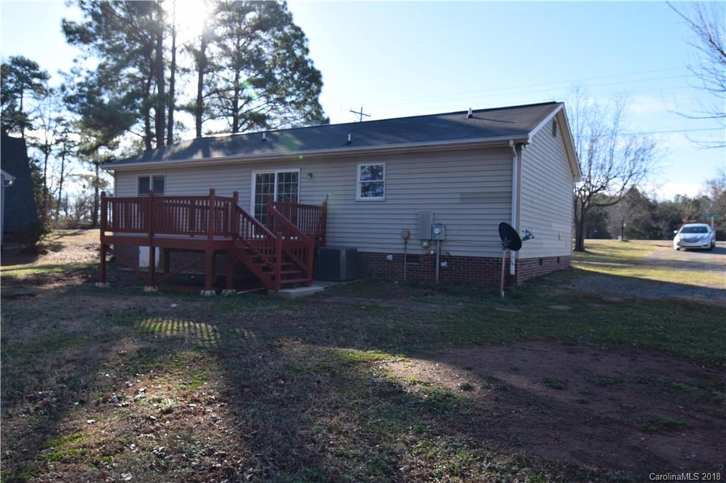 8667 Unity Church Road Denver, NC 28037 - Photo 23 of 23 a view of a back yard of the house