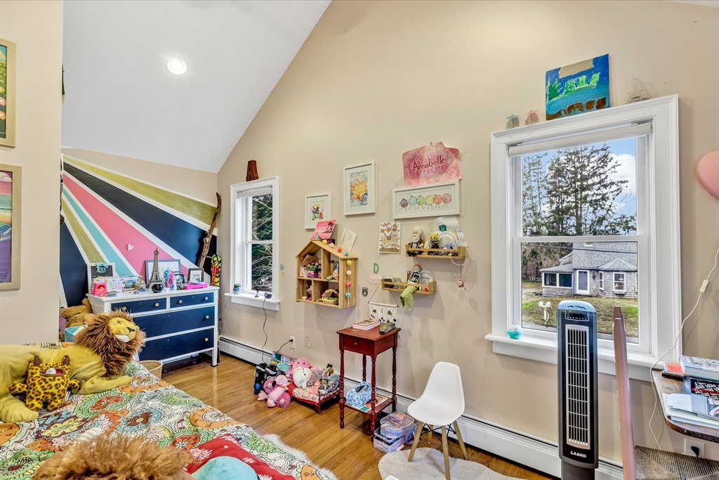 34 Weir Road Yarmouth, MA 02675 - Photo 29 of 39 a bedroom with furniture and a window