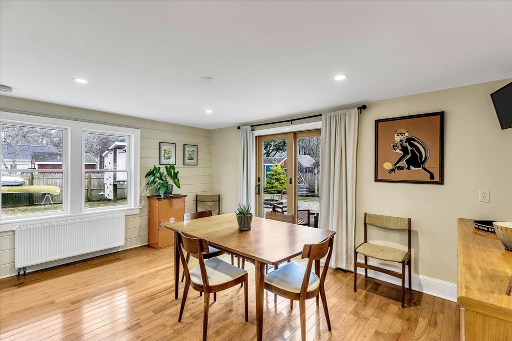 34 Weir Road Yarmouth, MA 02675 - Photo 4 of 39 a view of a dining room with furniture window and wooden floor