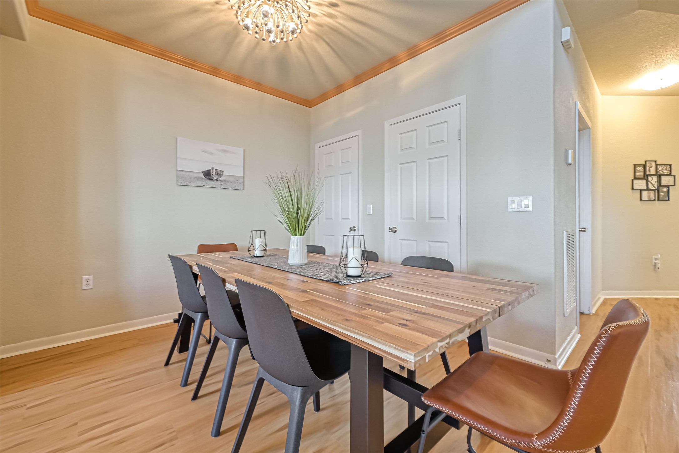 2102 Todville Road, Unit 9 Seabrook, TX 77586 - Photo 11 of 45 a view of a dining room with furniture and wooden floor