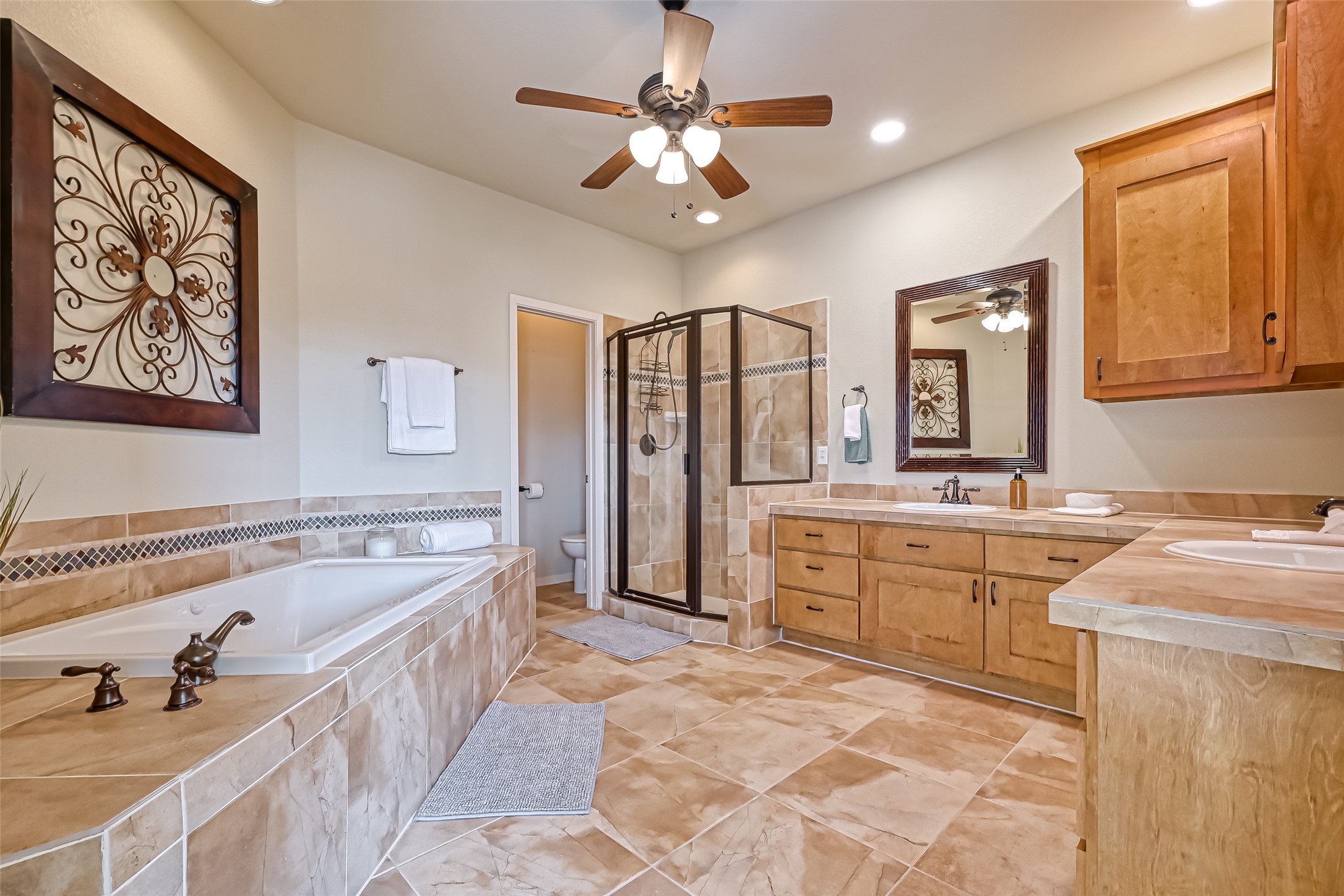 2102 Todville Road, Unit 9 Seabrook, TX 77586 - Photo 18 of 45 a spacious bathroom with a tub sink and mirror