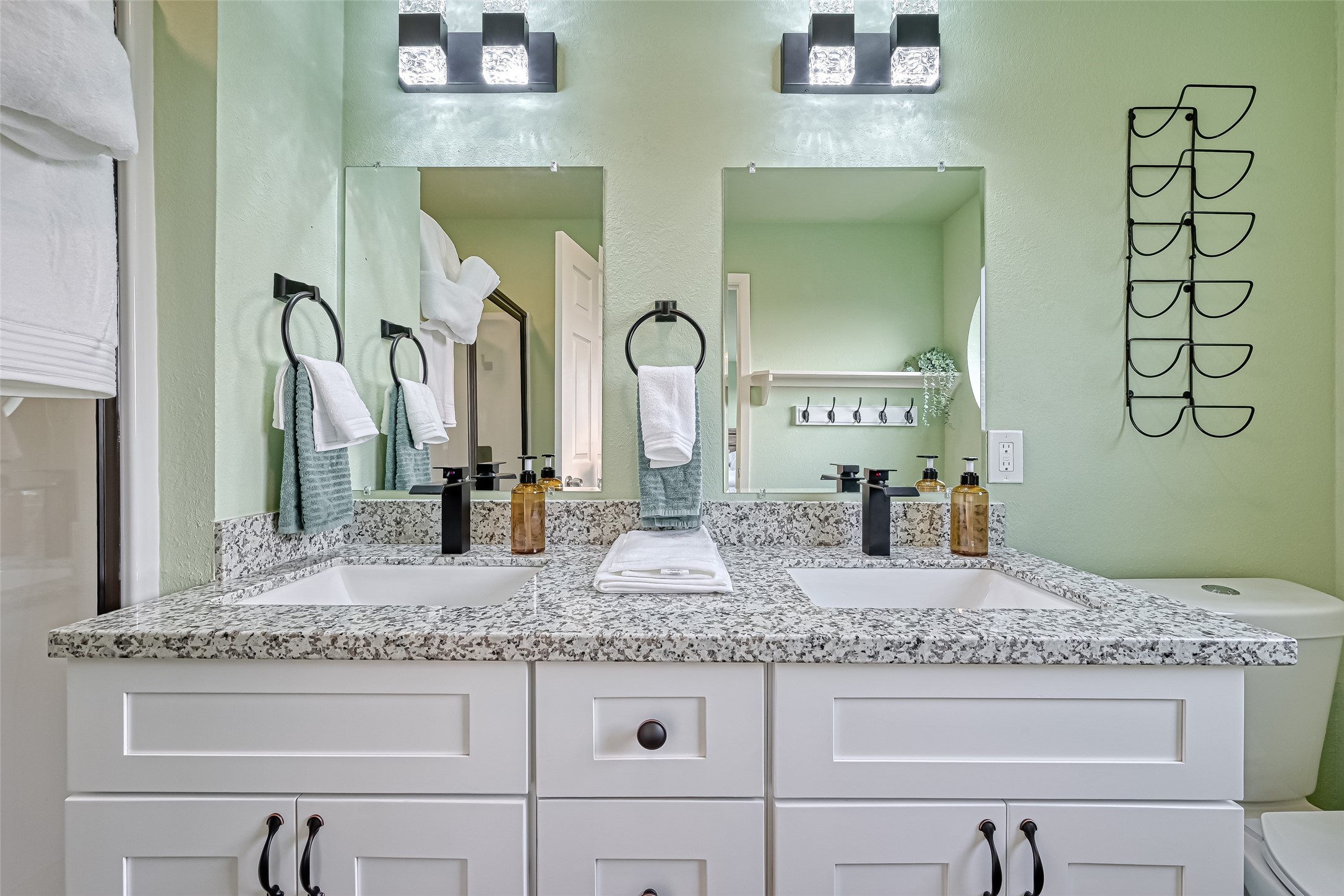 2102 Todville Road, Unit 9 Seabrook, TX 77586 - Photo 30 of 45 a bathroom with a granite countertop sink and a mirror
