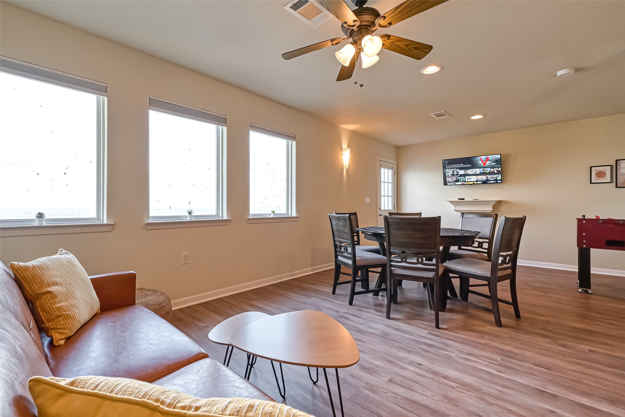 2102 Todville Road, Unit 9 Seabrook, TX 77586 - Photo 36 of 45 a view of a dining room with furniture window and wooden floor