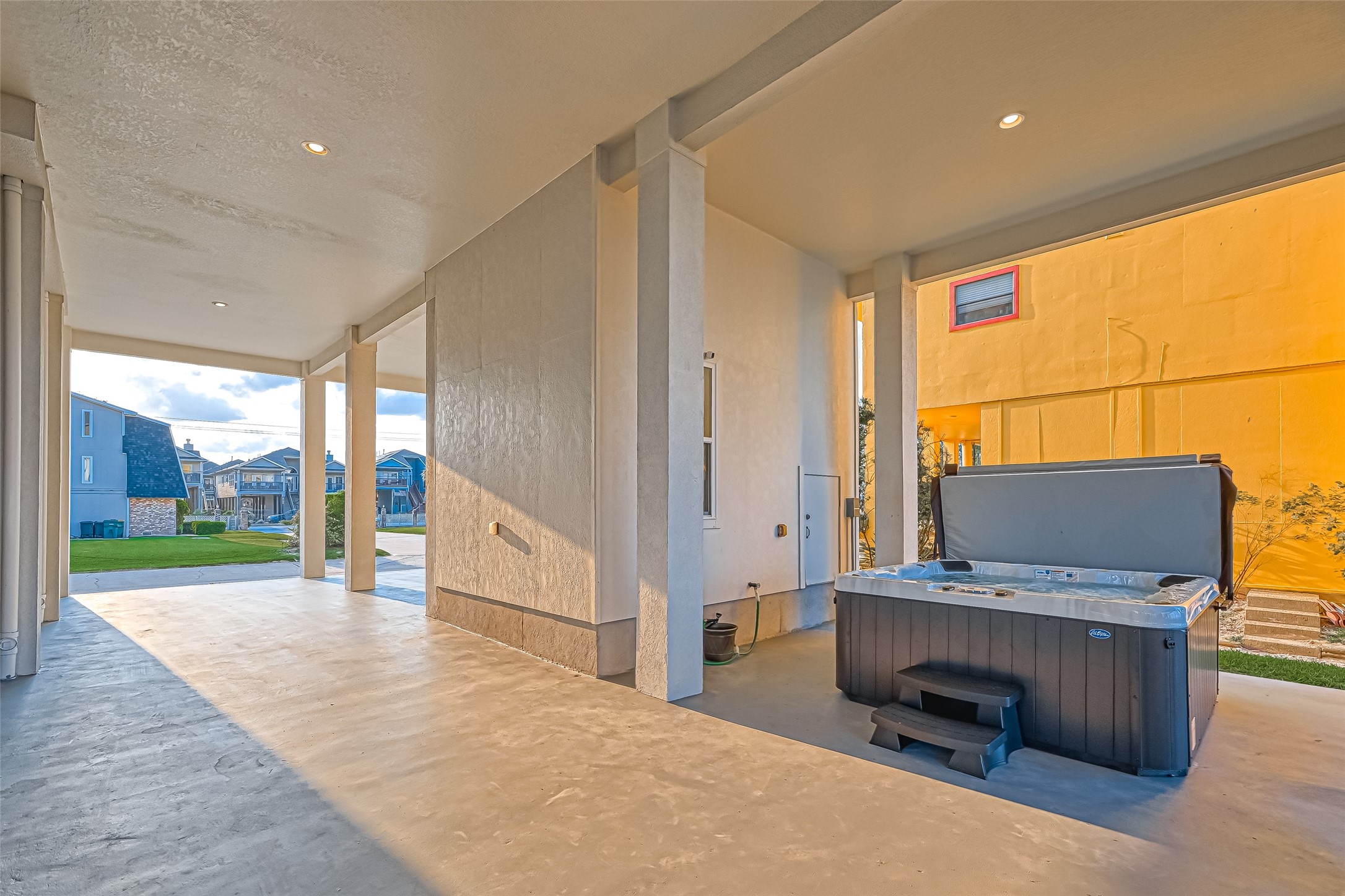 2102 Todville Road, Unit 9 Seabrook, TX 77586 - Photo 40 of 45 a view of a porch with a table and chairs