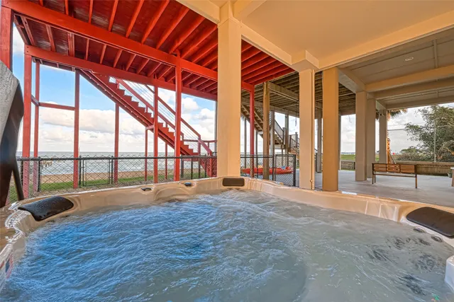 a view of an empty room with a large window