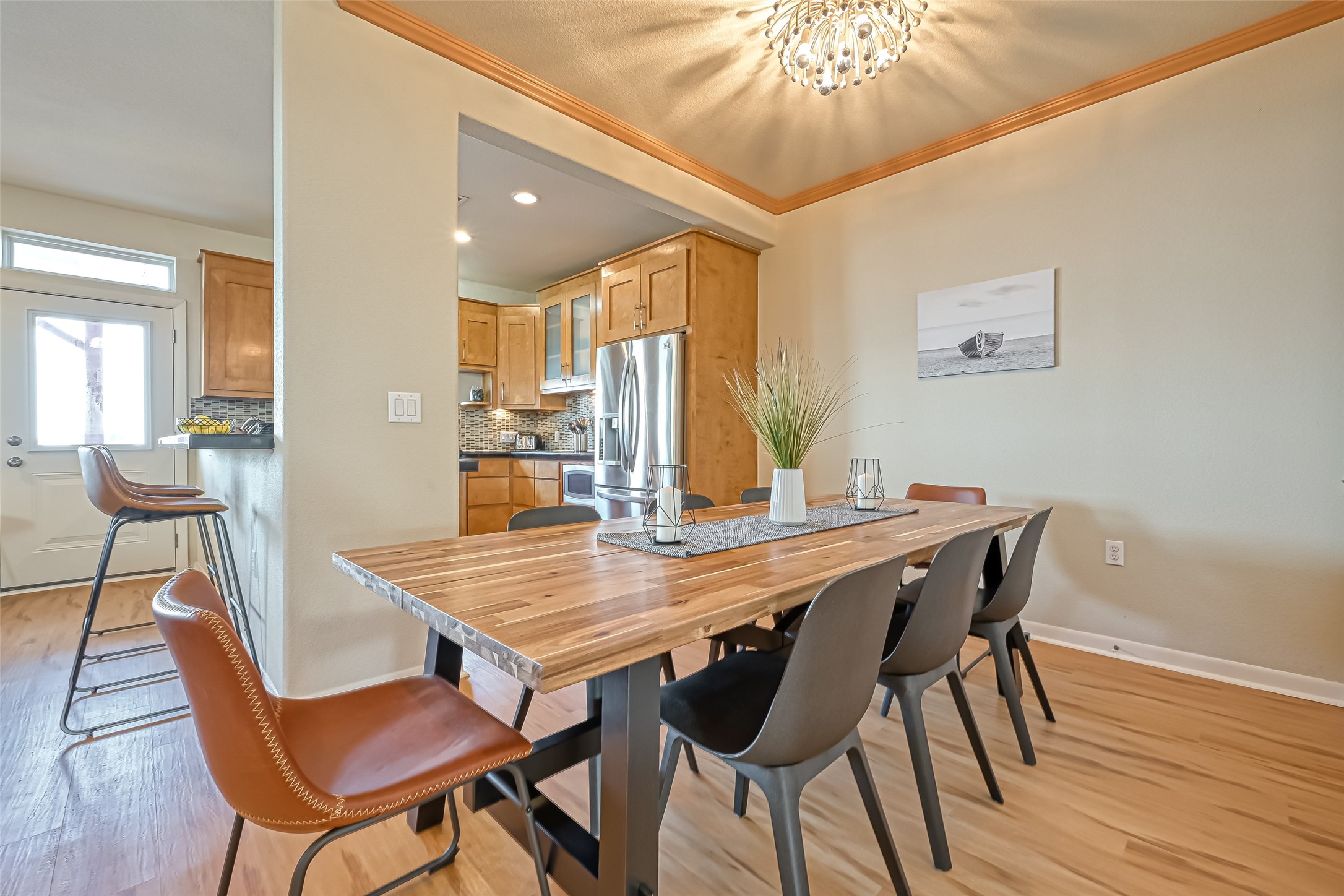2102 Todville Road, Unit 9 Seabrook, TX 77586 - Photo 10 of 45 a view of a dining room with furniture and wooden floor