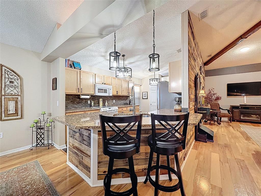 5407 Treig Lane Wesley Chapel, FL 33545 - Photo 20 of 70 a view of a dining room with furniture