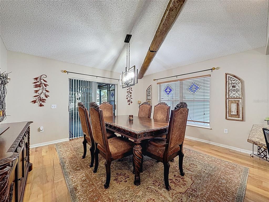 5407 Treig Lane Wesley Chapel, FL 33545 - Photo 22 of 70 a dining room with furniture and window