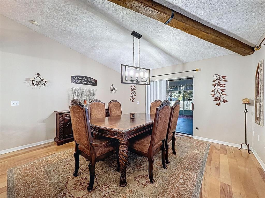 5407 Treig Lane Wesley Chapel, FL 33545 - Photo 23 of 70 a view of a dining room with furniture