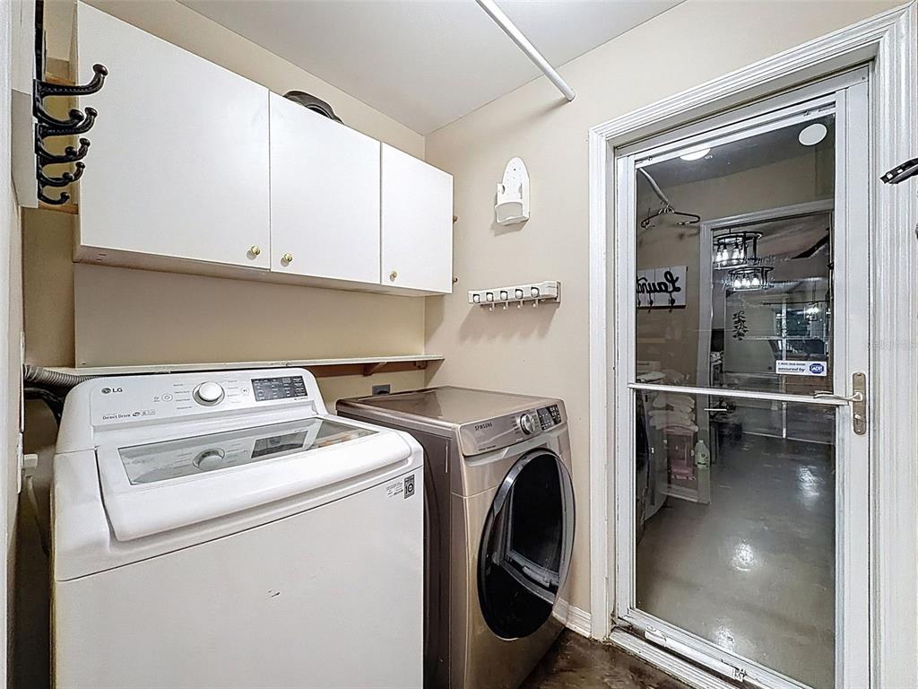 5407 Treig Lane Wesley Chapel, FL 33545 - Photo 45 of 70 a utility room with dryer and washer