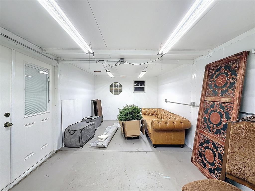 5407 Treig Lane Wesley Chapel, FL 33545 - Photo 46 of 70 a bedroom with furniture and a window