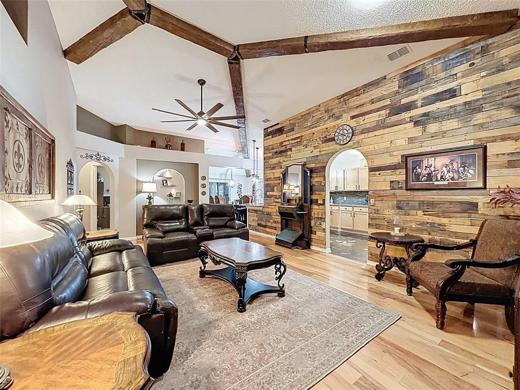 5407 Treig Lane Wesley Chapel, FL 33545 - Photo 6 of 70 a living room with furniture