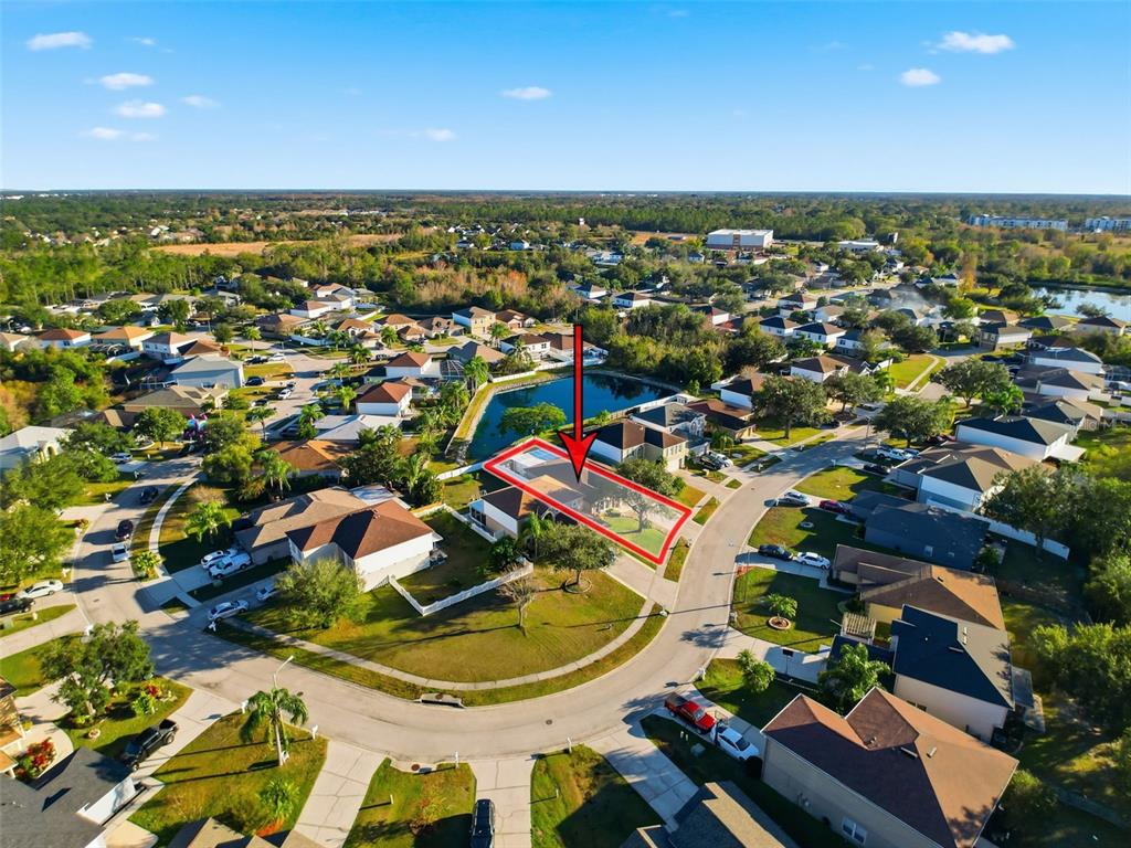 5407 Treig Lane Wesley Chapel, FL 33545 - Photo 63 of 70 an aerial view of residential houses with outdoor space