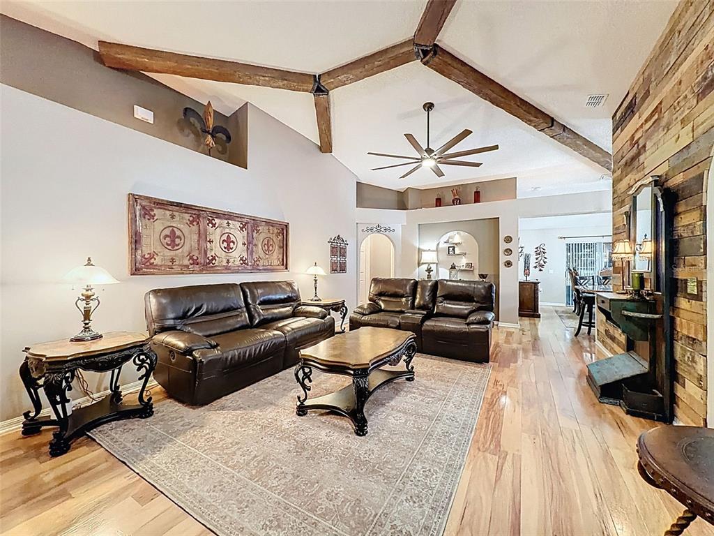 5407 Treig Lane Wesley Chapel, FL 33545 - Photo 9 of 70 a living room with furniture