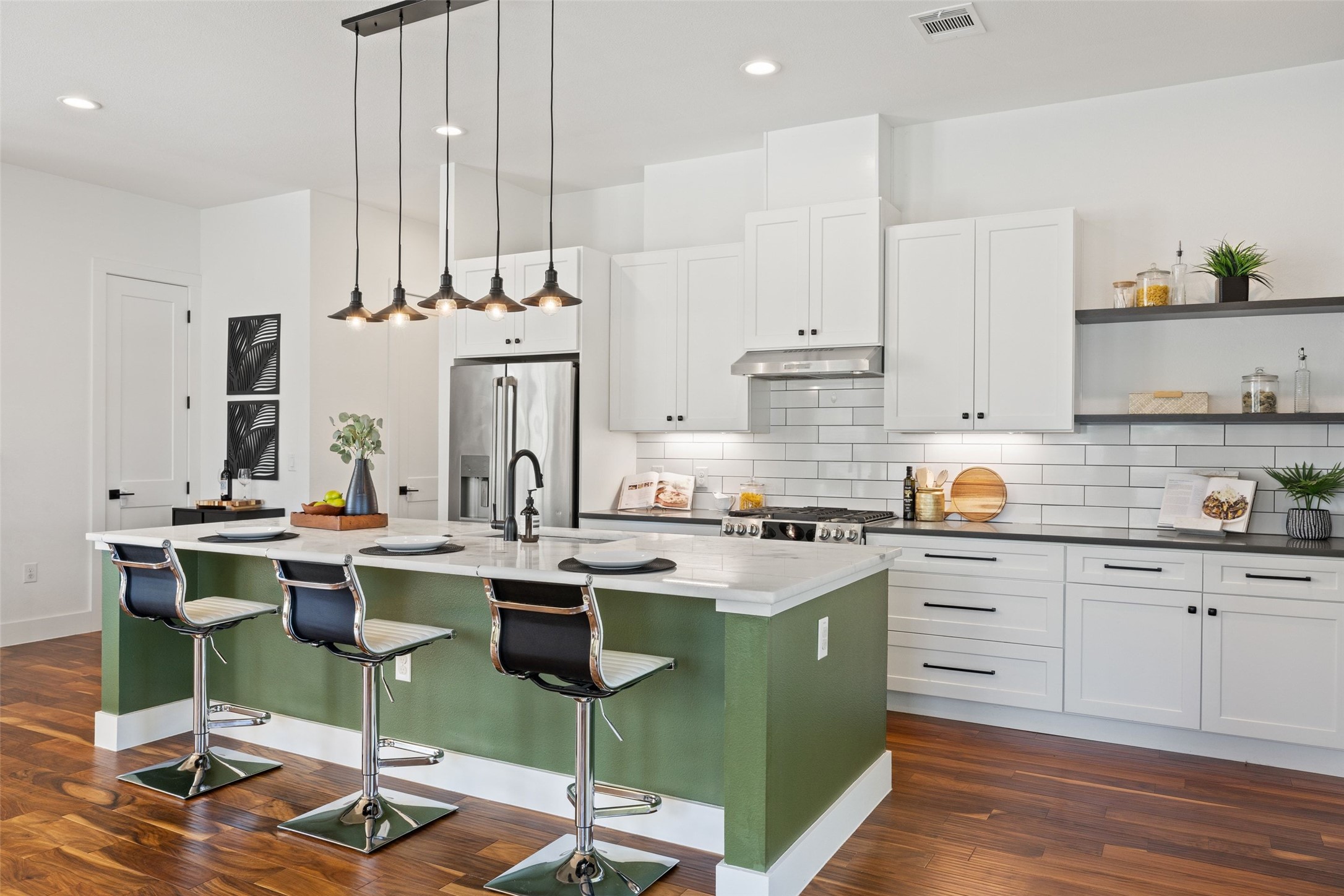 5601 Jackie Robinson Street, Unit 1 Austin, TX 78721 - Photo 13 of 40 An inviting kitchen made for the homeowner that loves to entertain.