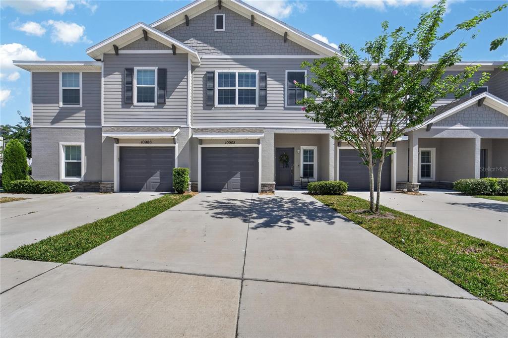 10908 Quickwater Court Riverview, FL 33569 - Photo 1 of 35 a front view of a house with a garden
