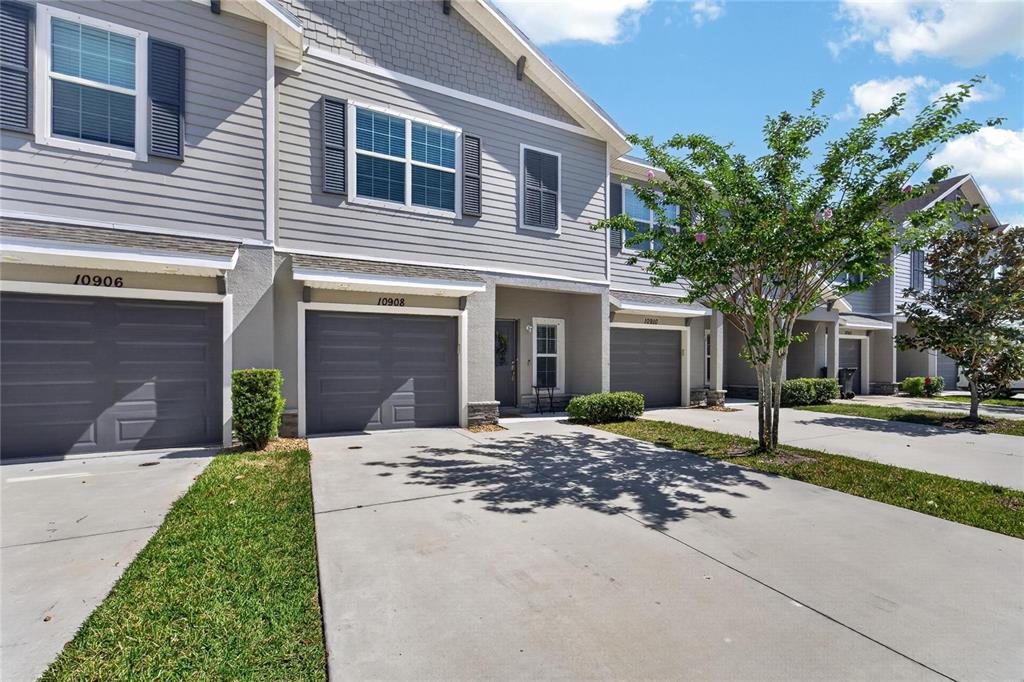 10908 Quickwater Court Riverview, FL 33569 - Photo 2 of 35 a front view of a house with a yard and garage