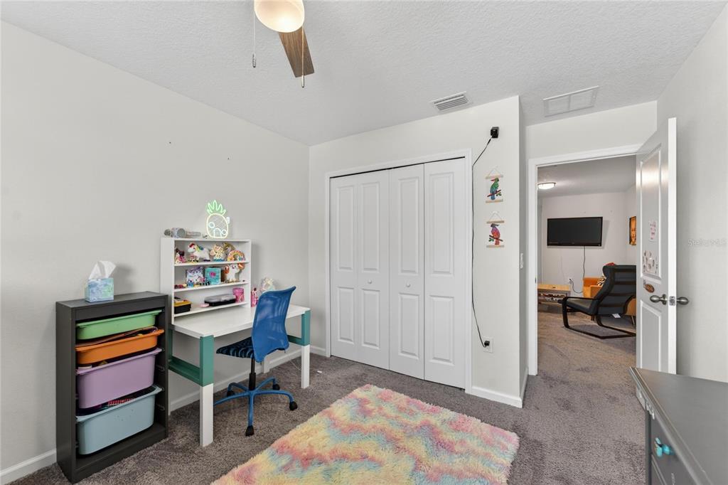 10908 Quickwater Court Riverview, FL 33569 - Photo 27 of 35 a view of a workspace with furniture