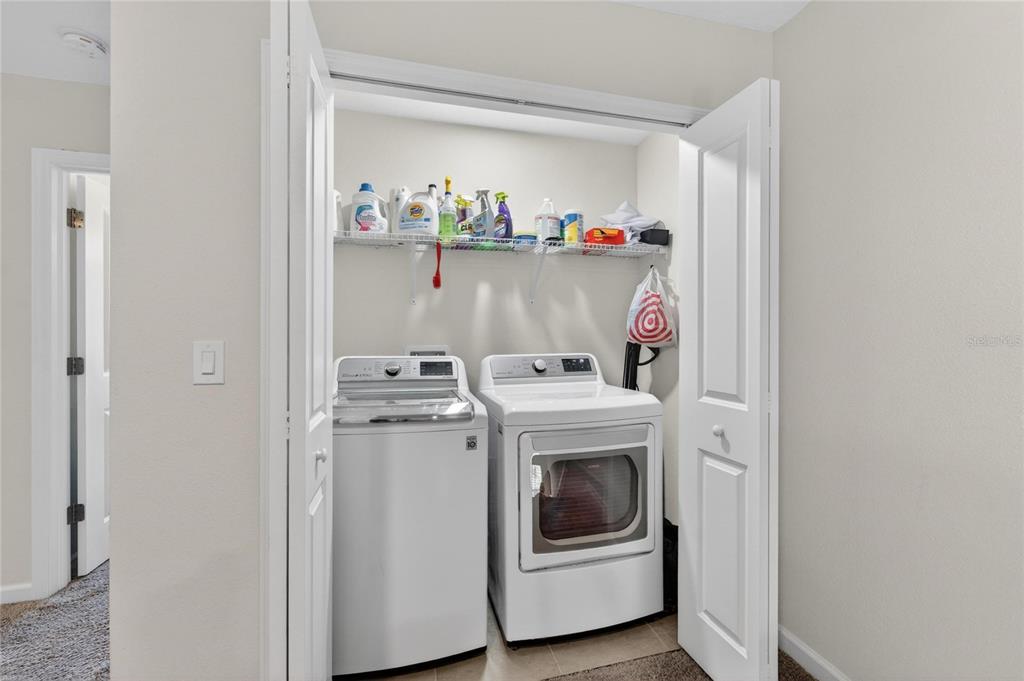 10908 Quickwater Court Riverview, FL 33569 - Photo 29 of 35 a utility room with dryer and washer