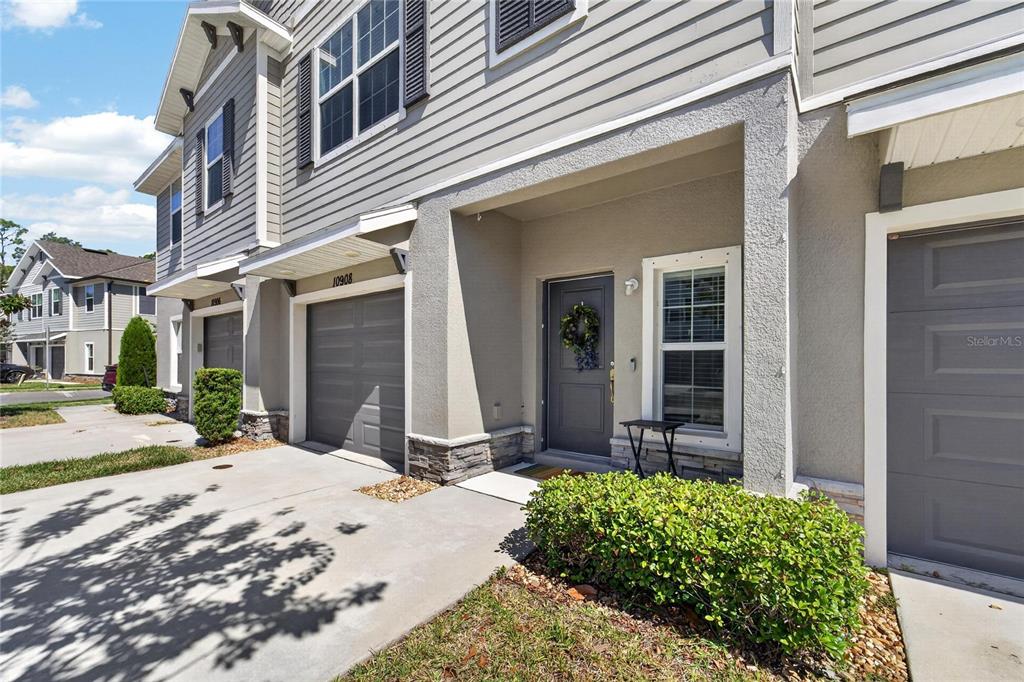10908 Quickwater Court Riverview, FL 33569 - Photo 3 of 35 a front view of a house with a yard