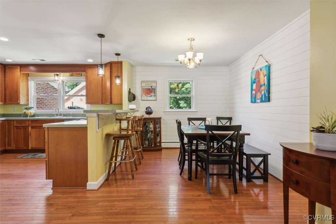 3124 North Riverside Drive Lanexa, VA 23089 - Photo 12 of 50 a view of a dining room with furniture window and wooden floor