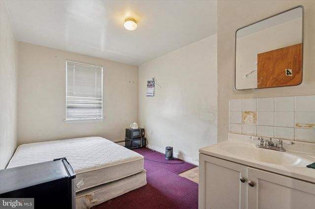a view of a hallway with staircase