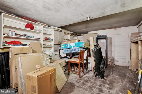 a gym room with lots of gym equipment