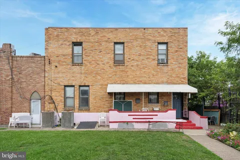 a view of a chairs in front of house