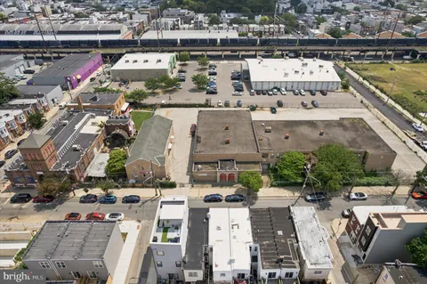 an aerial view of a house with swimming pool