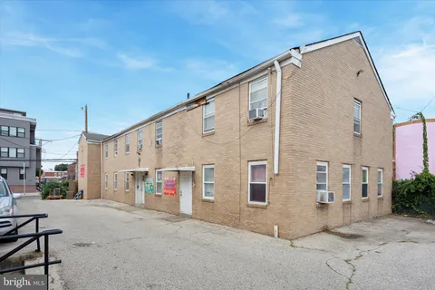 a view of a street with cars