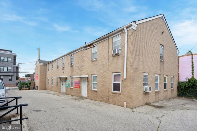 a view of a street with cars