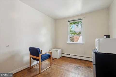 a room with furniture and a window