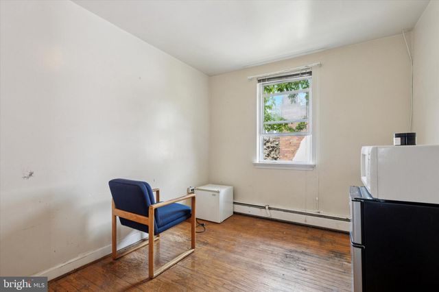 a room with furniture and a window