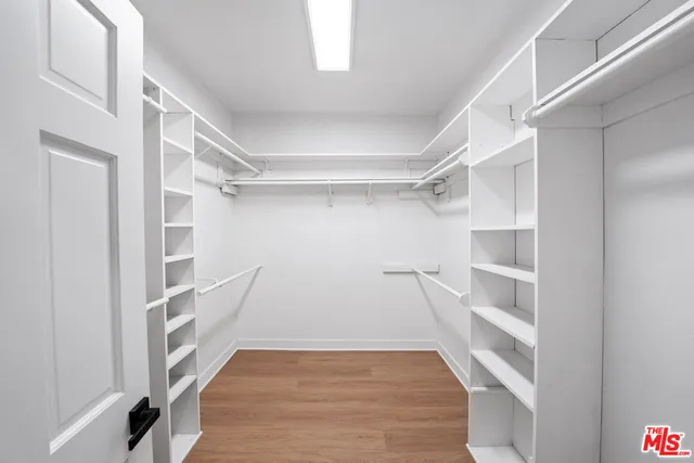 a view of an empty walk in closet