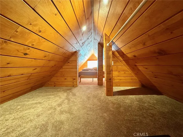 a balcony with trees in the background