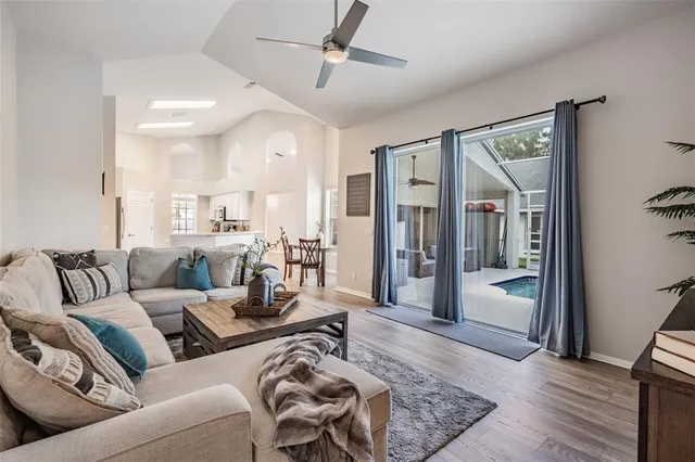 a living room with furniture and a rug