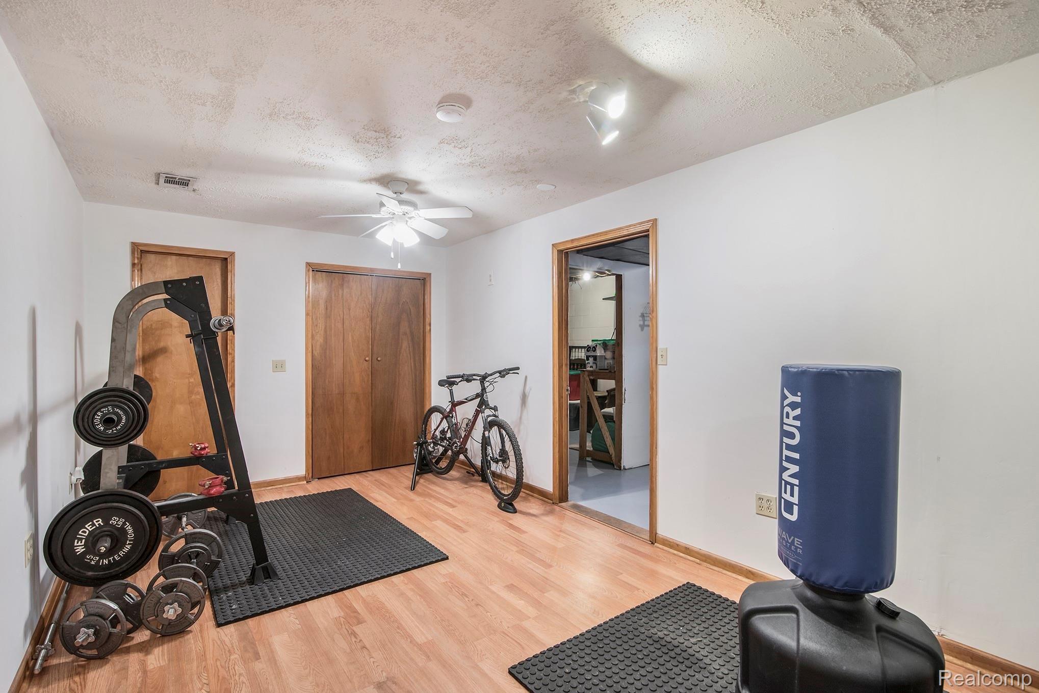 1860 Echo Hills Road Howell, MI 48855 - Photo 15 of 25 basement rec room