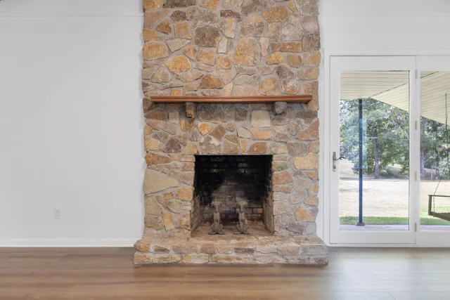 a view of a room with wooden walls