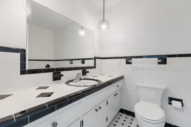 a house with trees in the background