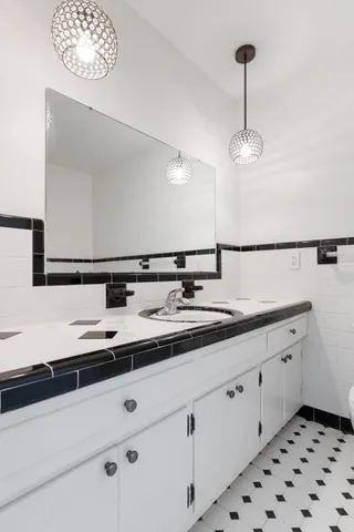 a view of a house with a yard and garage