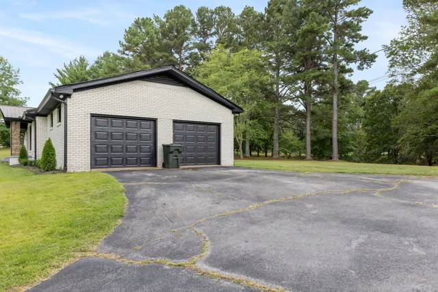 a view of room with window and hardwood floor