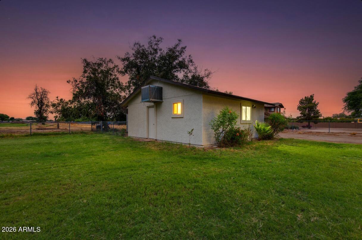 7101 North Perryville Road Waddell, AZ 85355 - Photo 47 of 66 7101 N Perryville detached garage backsi