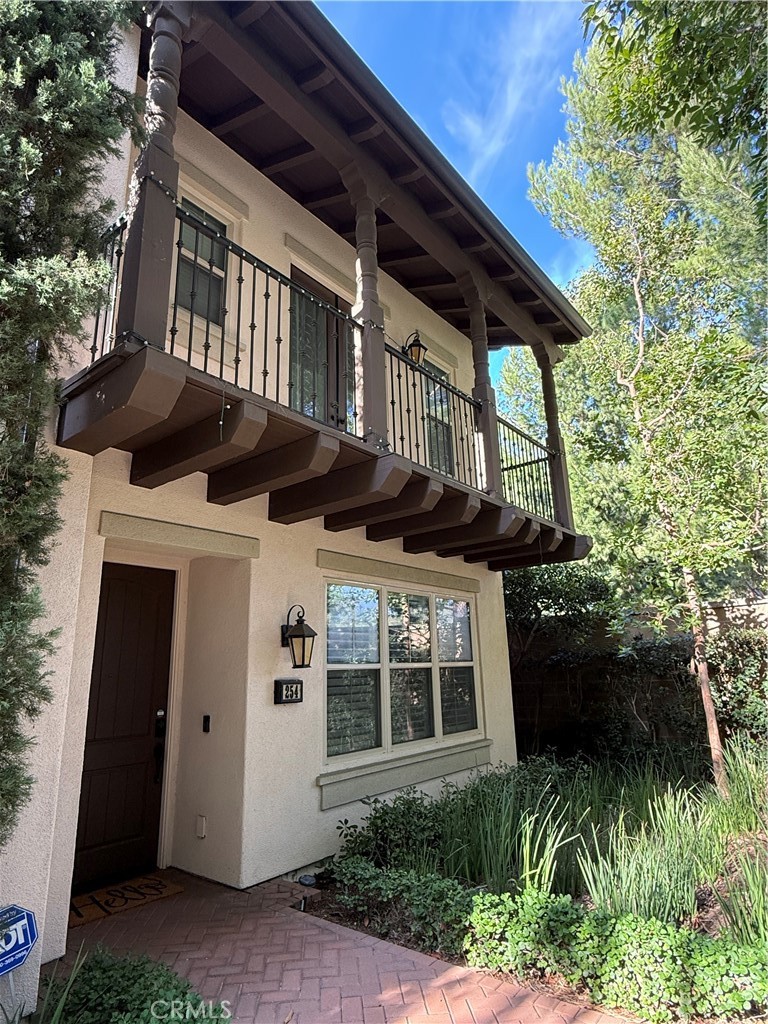 254 Kempton Irvine, CA 92620 - Photo 1 of 18 a front view of a house with a yard
