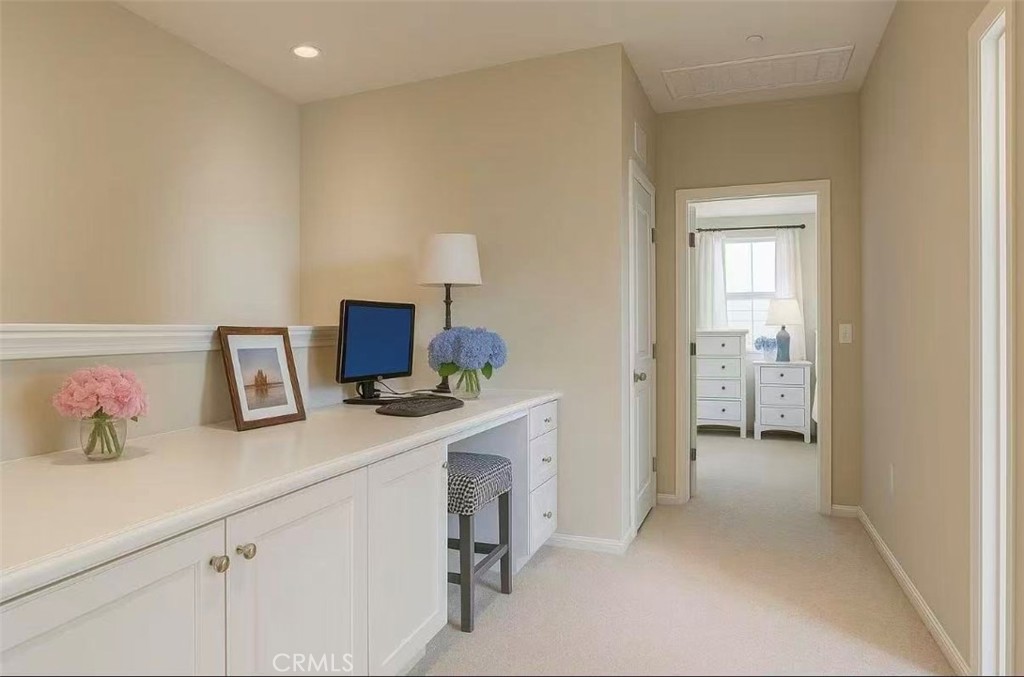 254 Kempton Irvine, CA 92620 - Photo 12 of 18 a hallway with a computer on a desk next to a window
