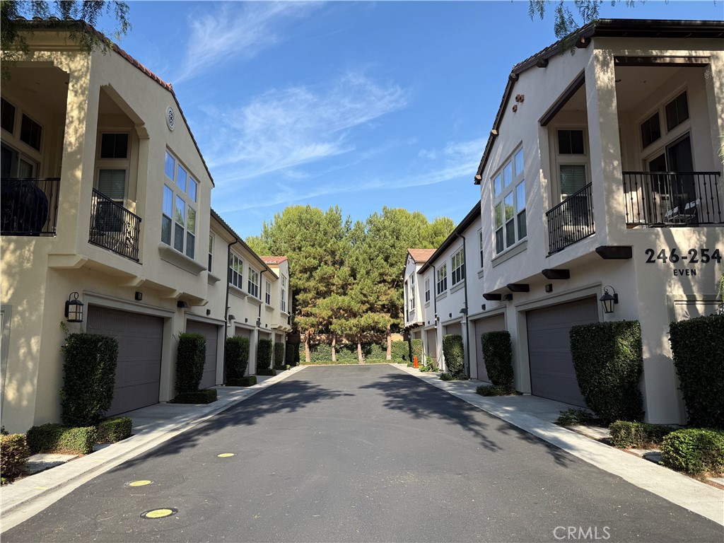 254 Kempton Irvine, CA 92620 - Photo 6 of 18 a view of a street with buildings in the background