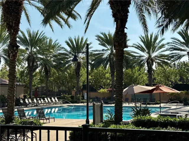 a front view of a house with garden and porch